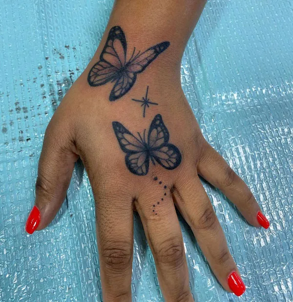 Butterfly hand tattoo 57