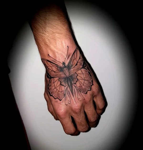 Butterfly hand tattoo 6