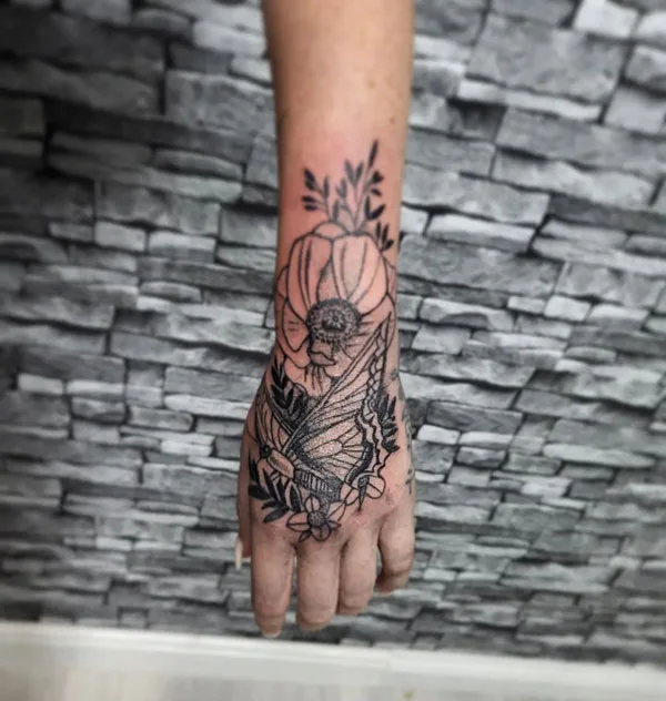 Butterfly hand tattoo 60