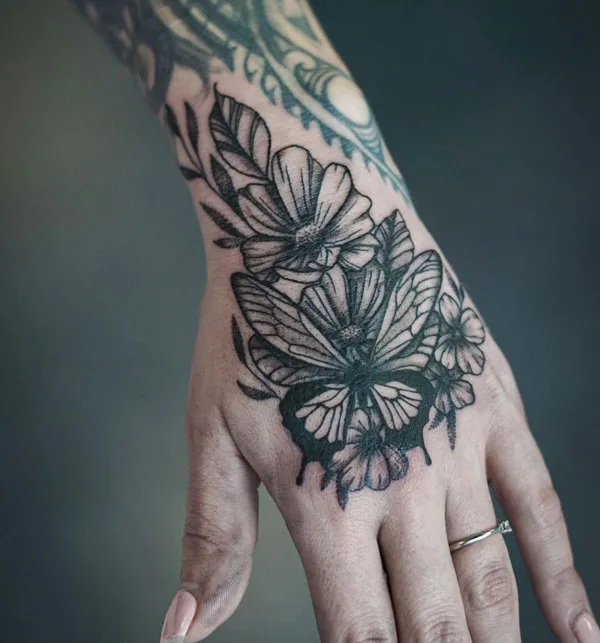 Butterfly hand tattoo 62