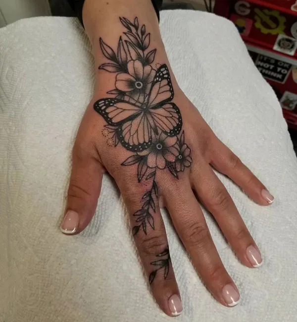 Butterfly hand tattoo 67