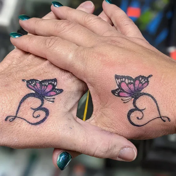 Butterfly hand tattoo matching