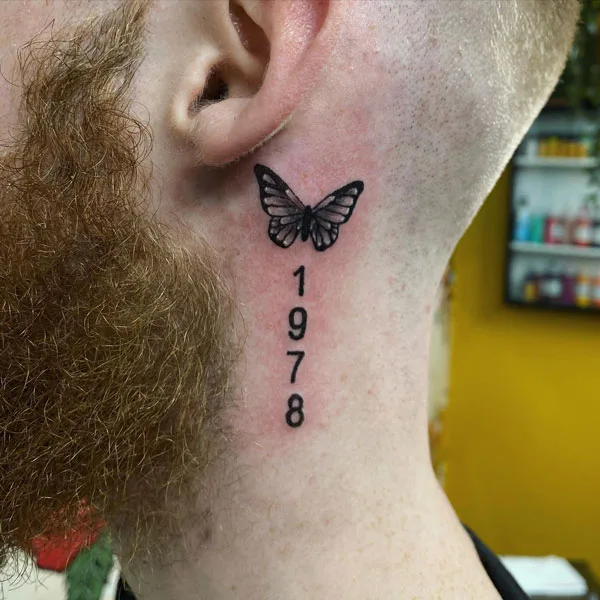 Butterfly tattoo behind ear 101