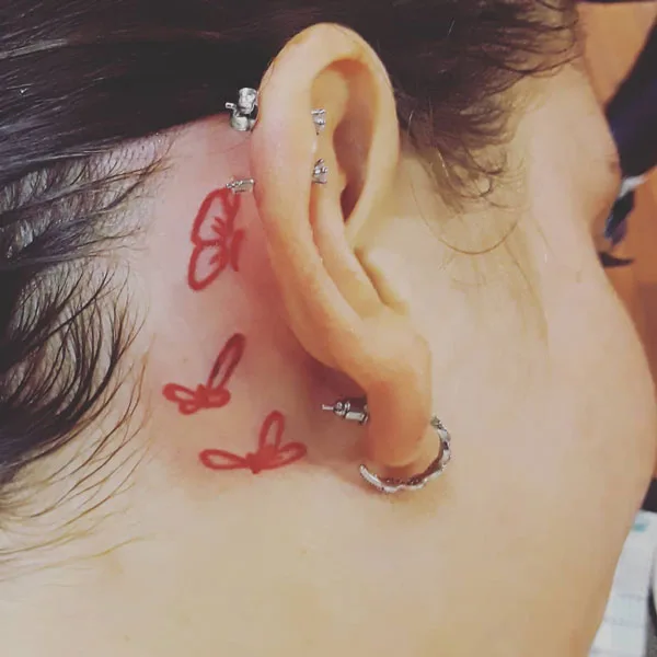 Butterfly tattoo behind ear 15