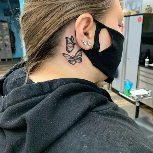 Butterfly tattoo behind ear 17
