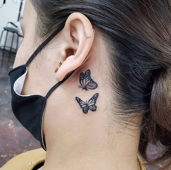 Butterfly tattoo behind ear 32