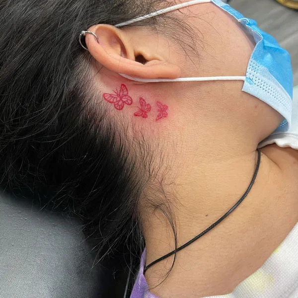 Butterfly tattoo behind ear 37