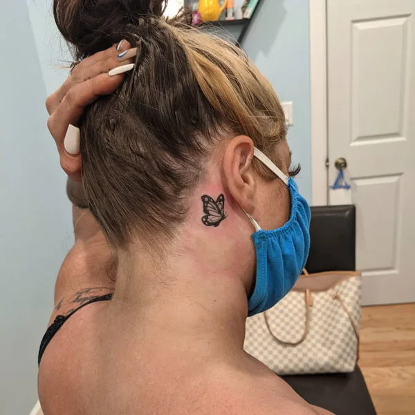 Butterfly tattoo behind ear 42