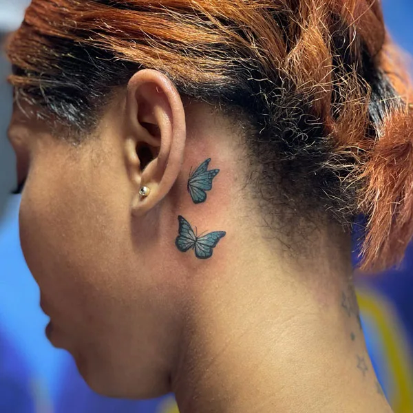 Butterfly tattoo behind ear 44