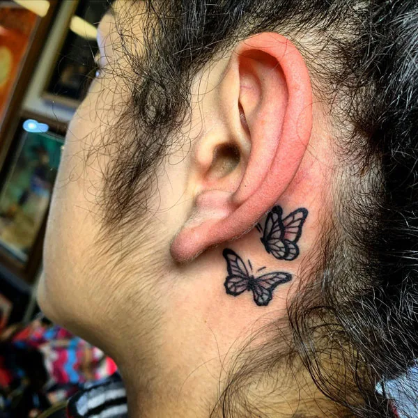 Butterfly tattoo behind ear 7