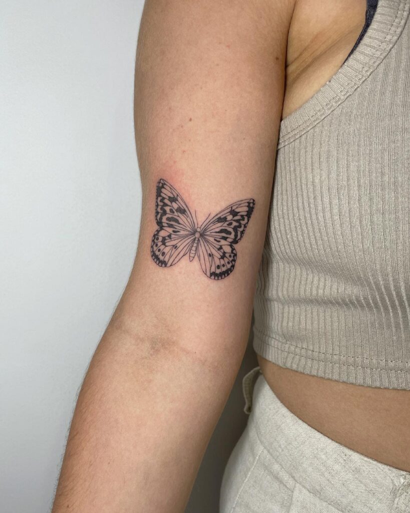 Butterfly Tattoo on the Above the Elbow: Graceful Transformation