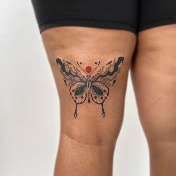 Butterfly thigh tattoo 18