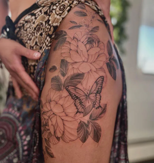 Butterfly thigh tattoo 19