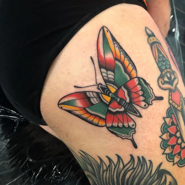 Butterfly thigh tattoo 24