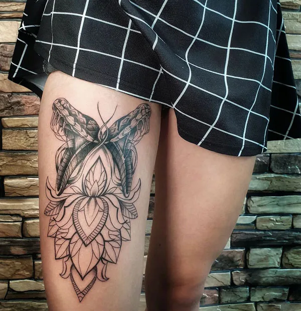 Butterfly thigh tattoo 27