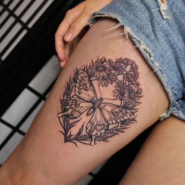 Butterfly thigh tattoo 28