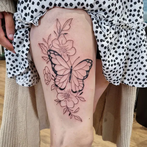 Butterfly thigh tattoo 36