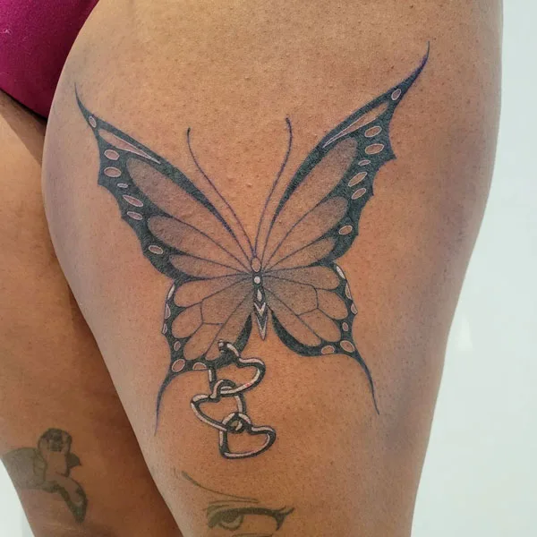 Butterfly thigh tattoo 42