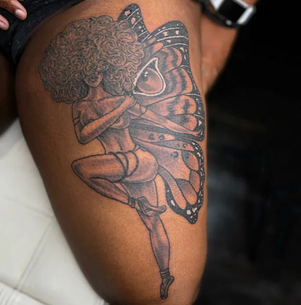 Butterfly thigh tattoo 44