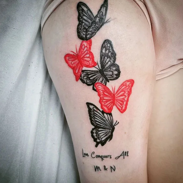 Butterfly thigh tattoo 45