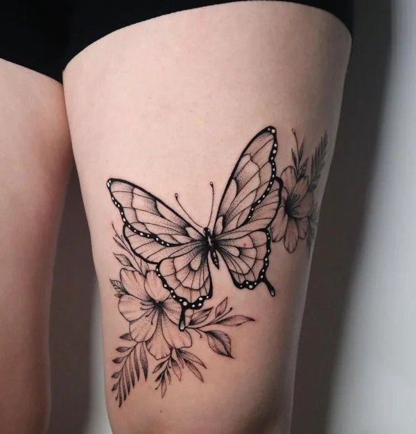 Butterfly thigh tattoo 47