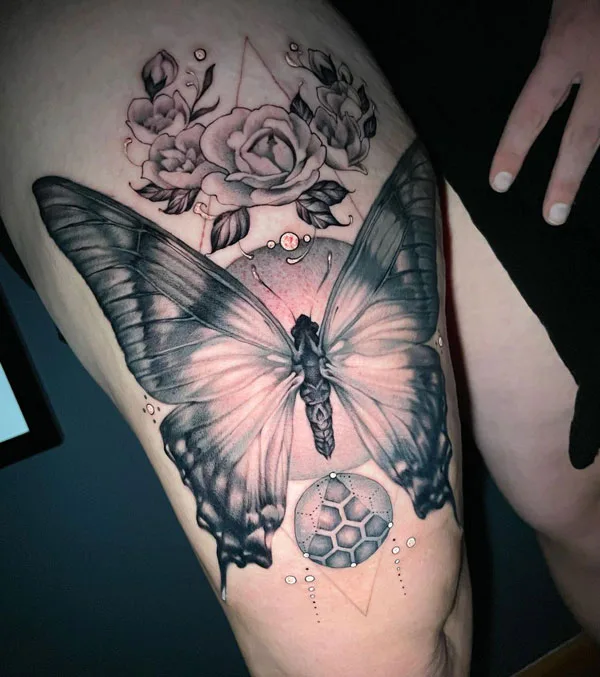 Butterfly thigh tattoo 50