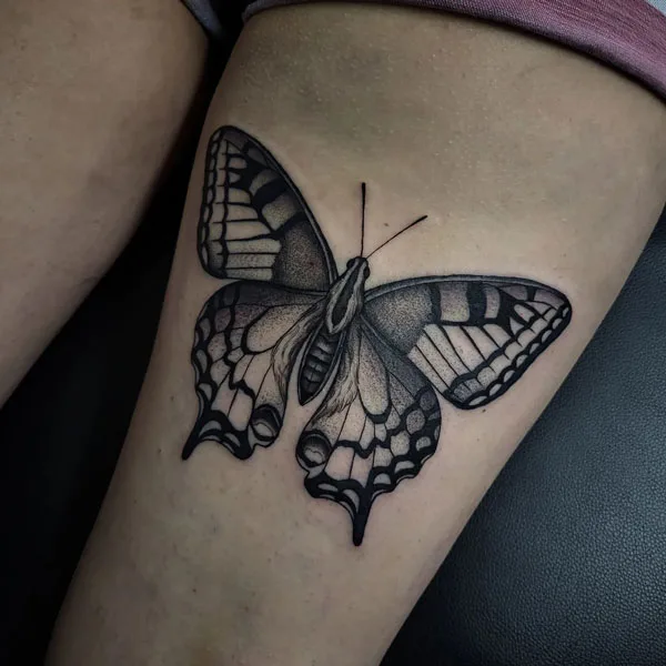 Butterfly thigh tattoo 53