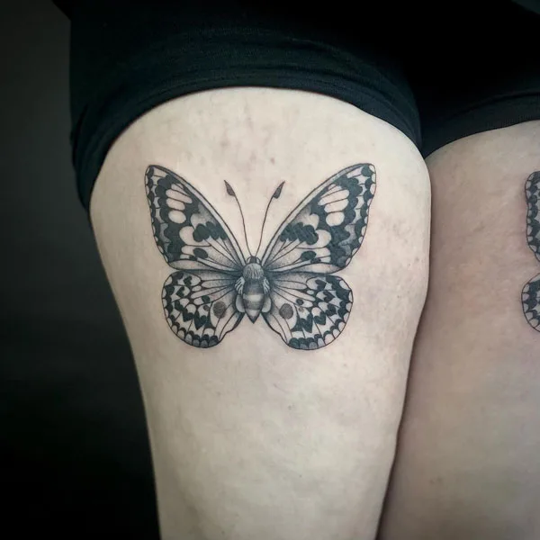 Butterfly thigh tattoo 55