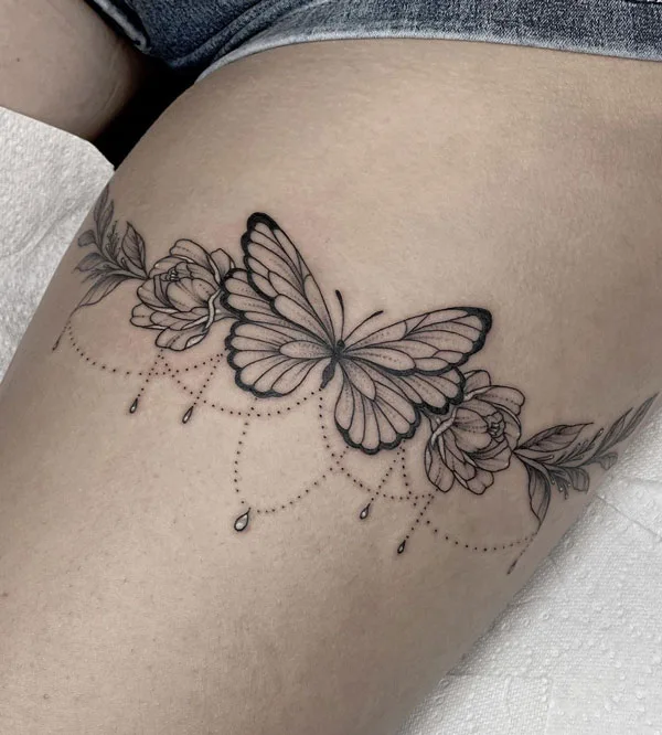 Butterfly thigh tattoo 61