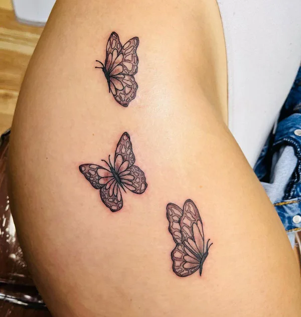Butterfly thigh tattoo 62