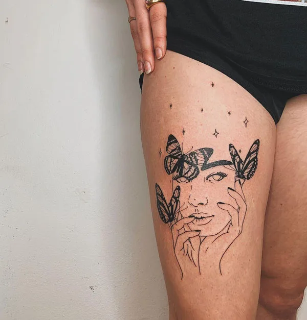 Butterfly thigh tattoo 7