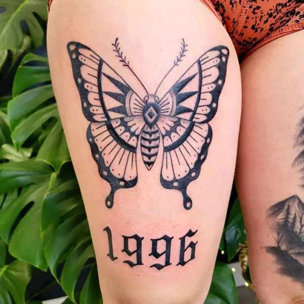 Butterfly thigh tattoo 70