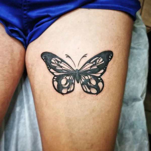 Butterfly thigh tattoo 71