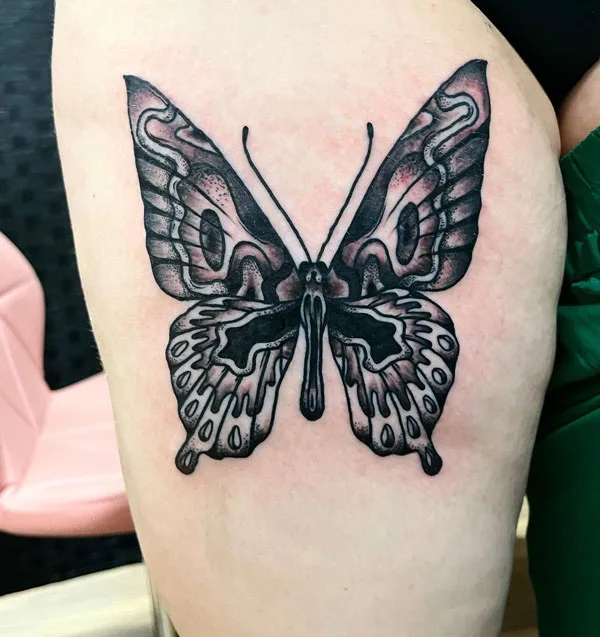 Butterfly thigh tattoo 78