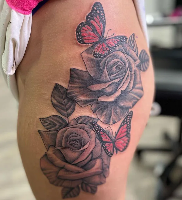 Butterfly thigh tattoo 79