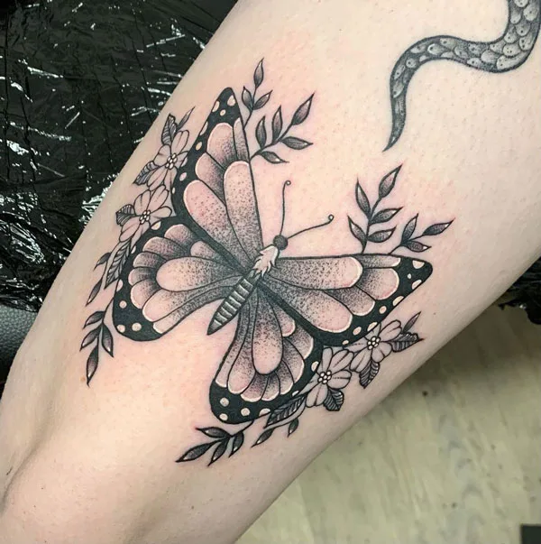 Butterfly thigh tattoo 82