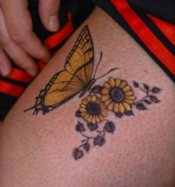 Butterfly thigh tattoo 83
