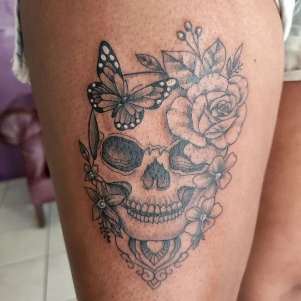 Butterfly thigh tattoo 86