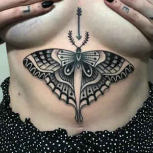Butterfly under boob tattoo 1