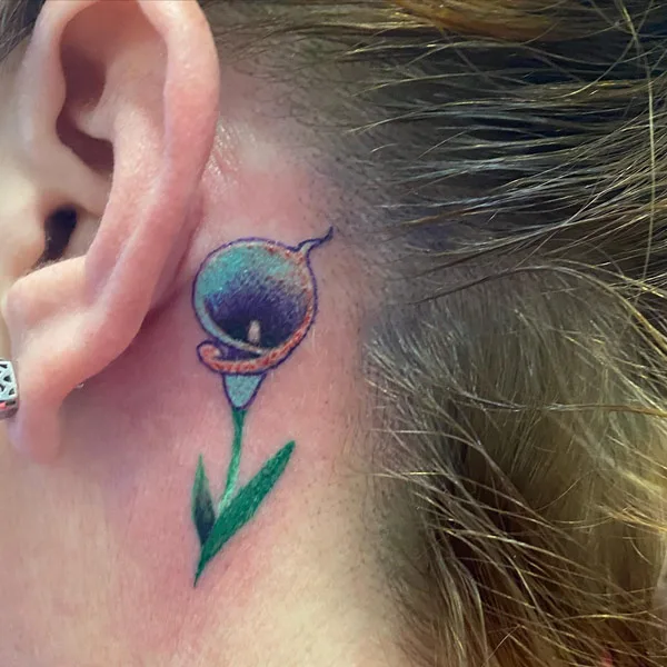 Calla Lily Behind the Ear Tattoo