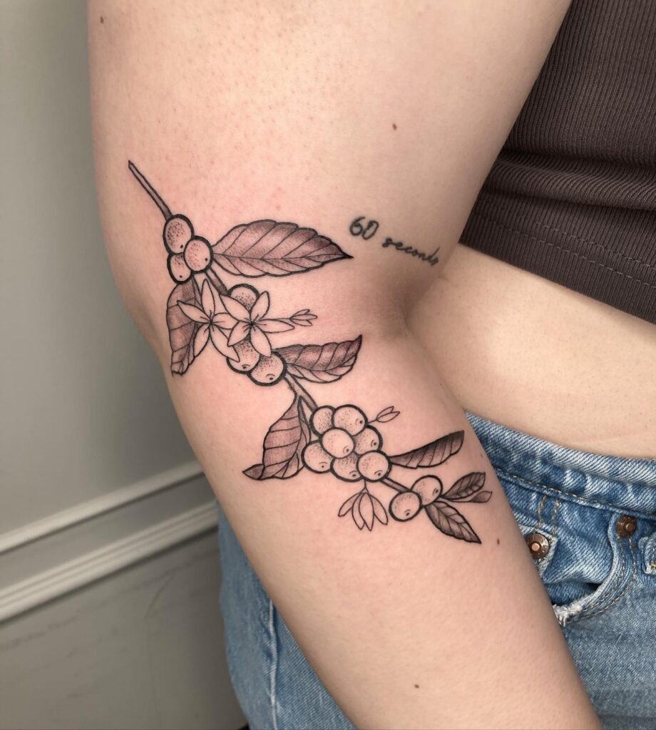 Captivating coffee plant forearm tattoo for females