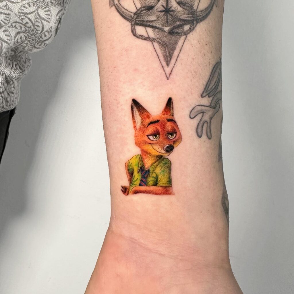 Cartoon Colorful Fox Tattoo on the Wrist, Featuring Nick Wilde: Zootopia Whimsy