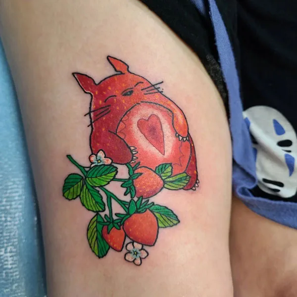 Cartoon strawberry tattoo
