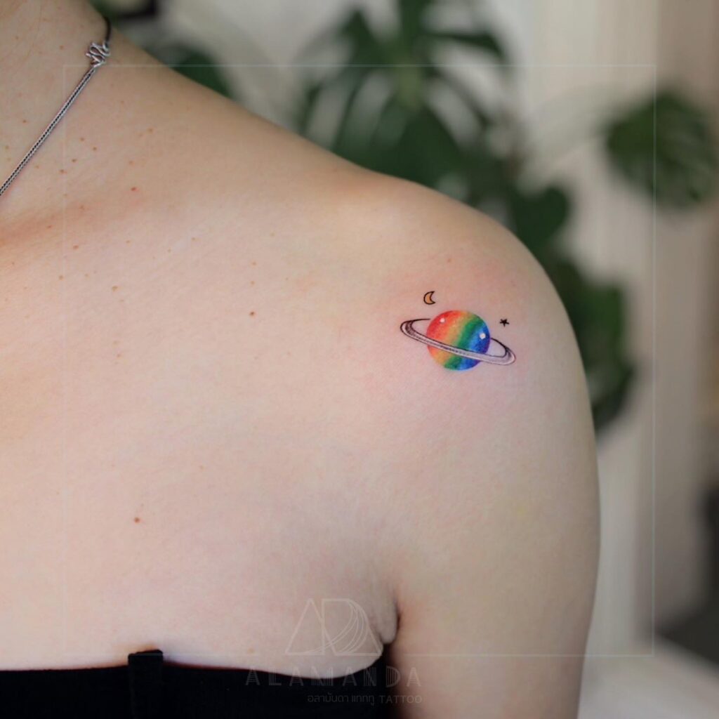 Celestial charm colorful solar system and star moon tattoo on the female shoulder