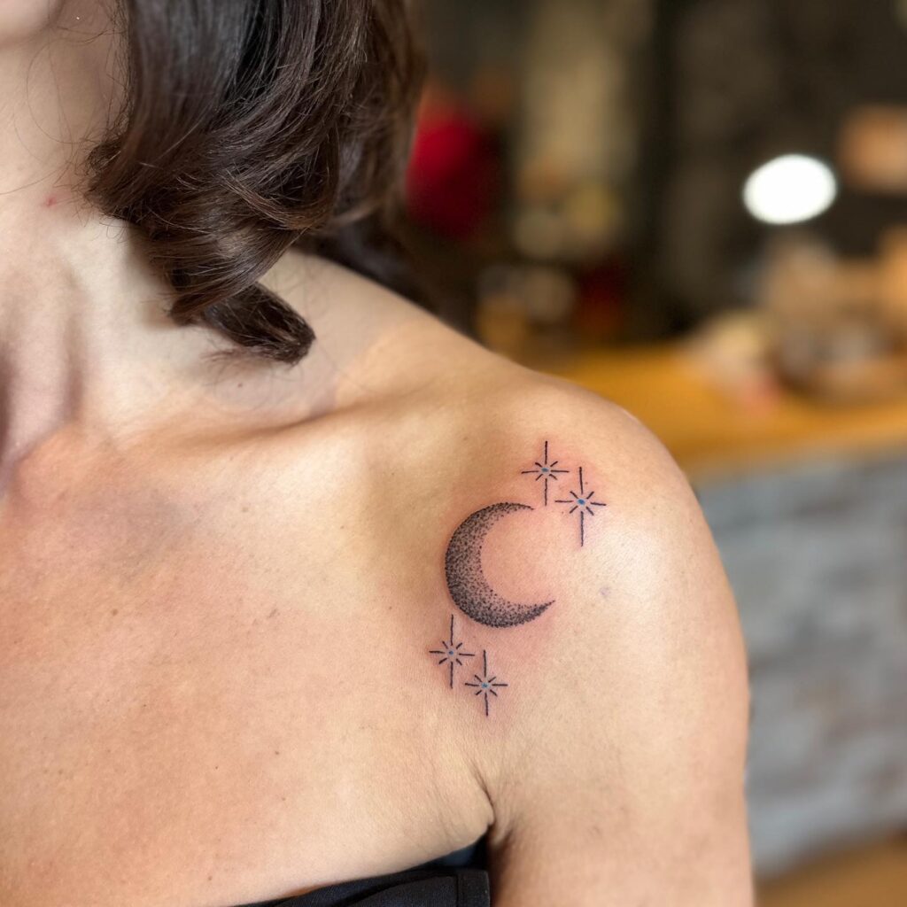 Celestial duo moon and star tattoos on shoulder for women