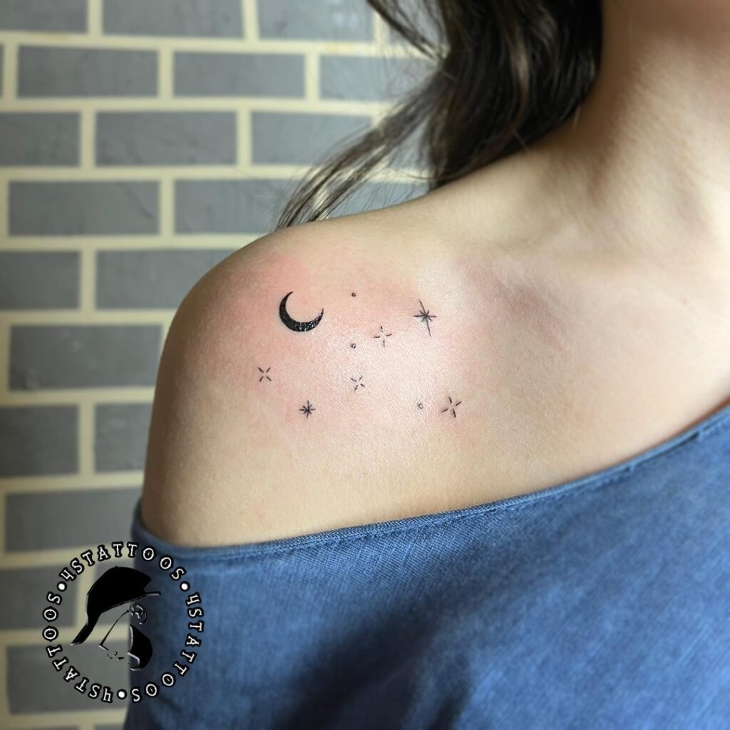 Celestial moon and north star shoulder tattoo symbolism