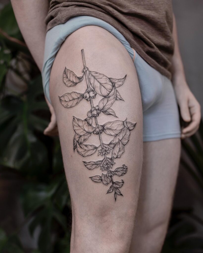 Charming Botanical Thigh Tattoo for Men Nature-Inspired Ink Art