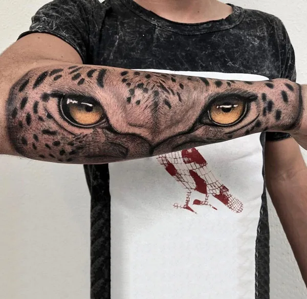 Cheetah eyes tattoo