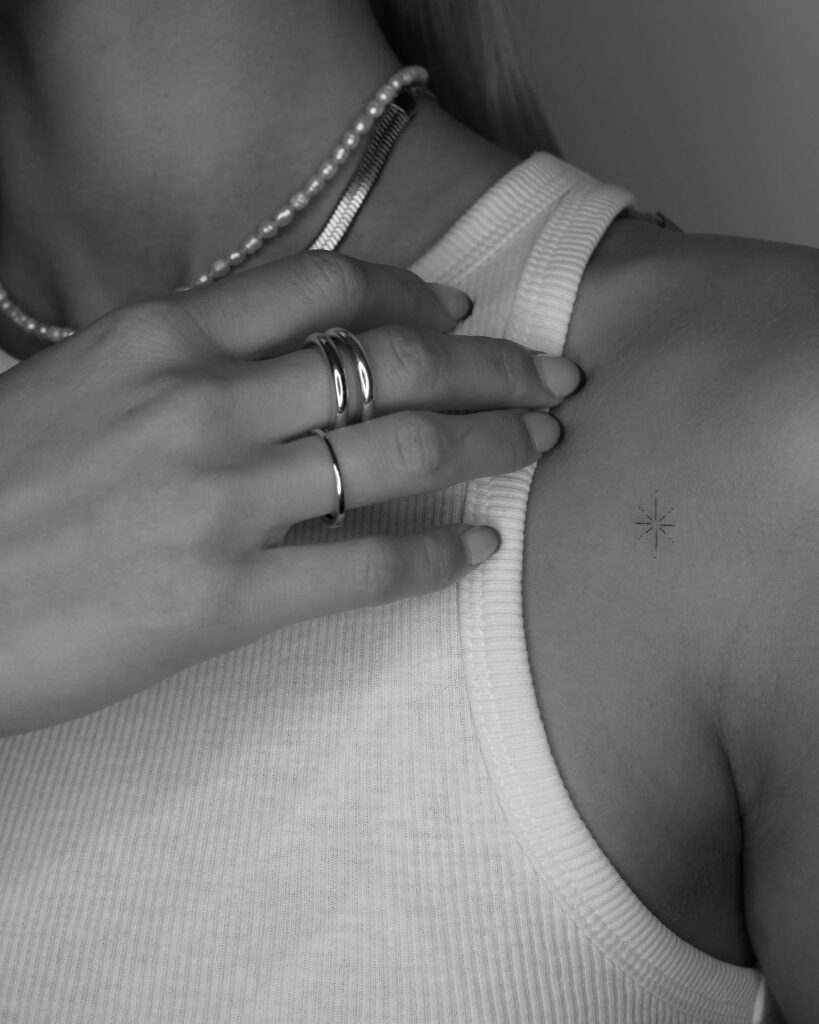 Chic fine line star tattoo on the shoulder guide