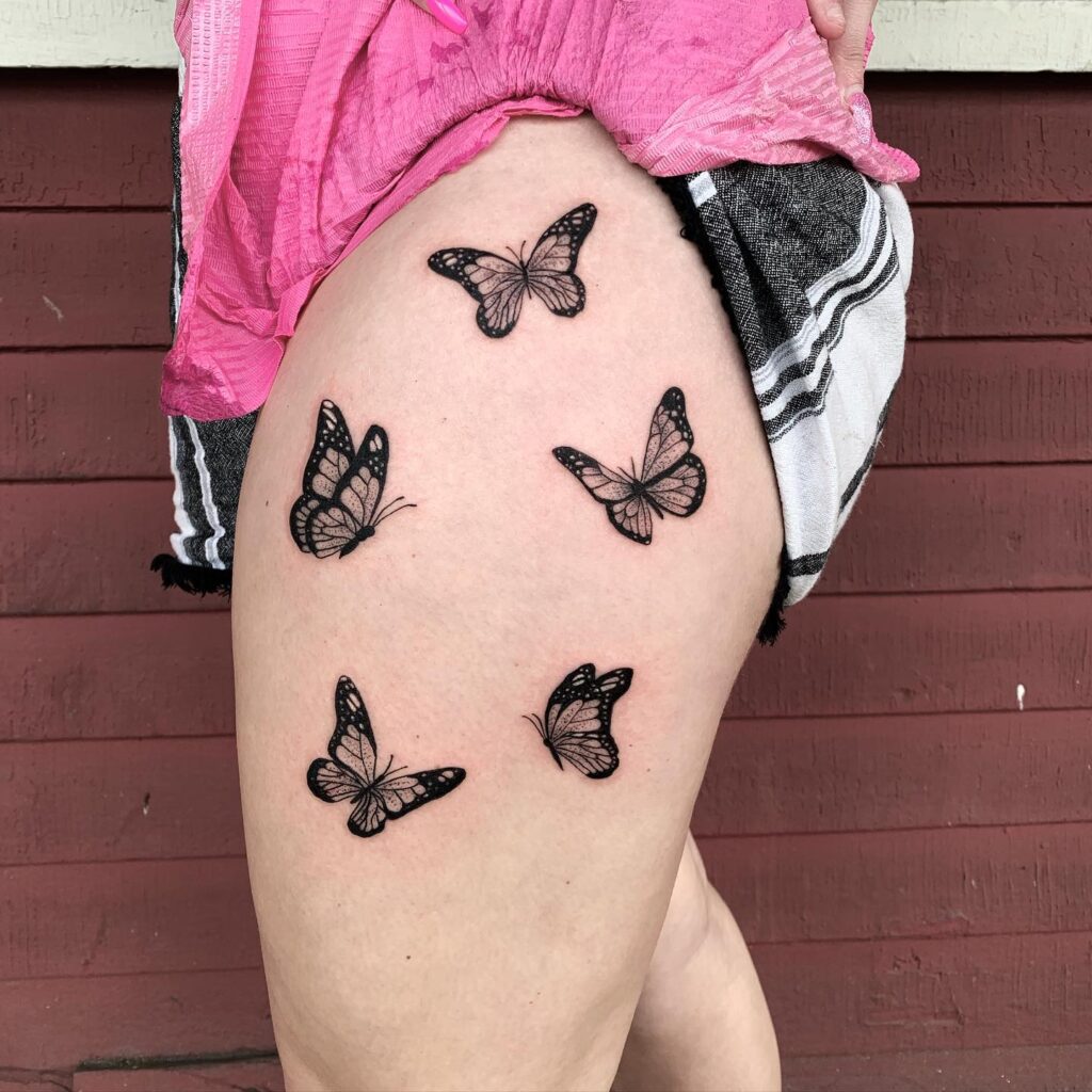 Circinate Butterfly Tattoos on the Thigh